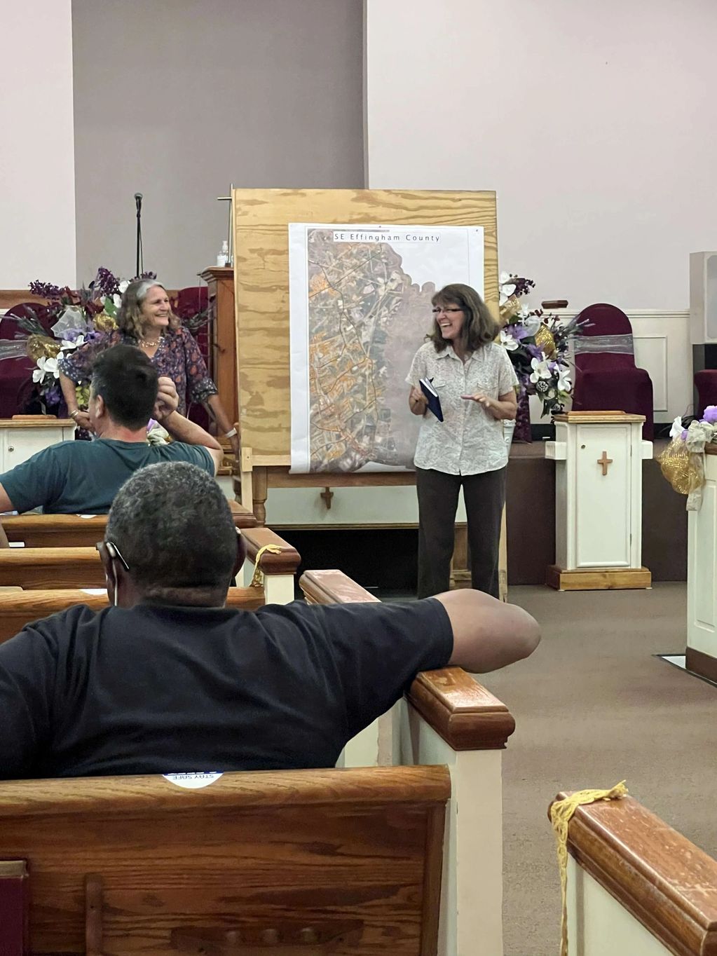 Community gathering to plan ways to get policy makers to reduce warehouse construction in Effingham.