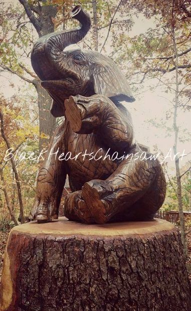 Wooden Hand Carved Sitting Elephant Sculpture - Chainsaw Carving carved out of Oak