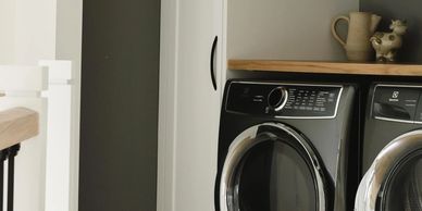 new laundry cabinets with washer and dryer