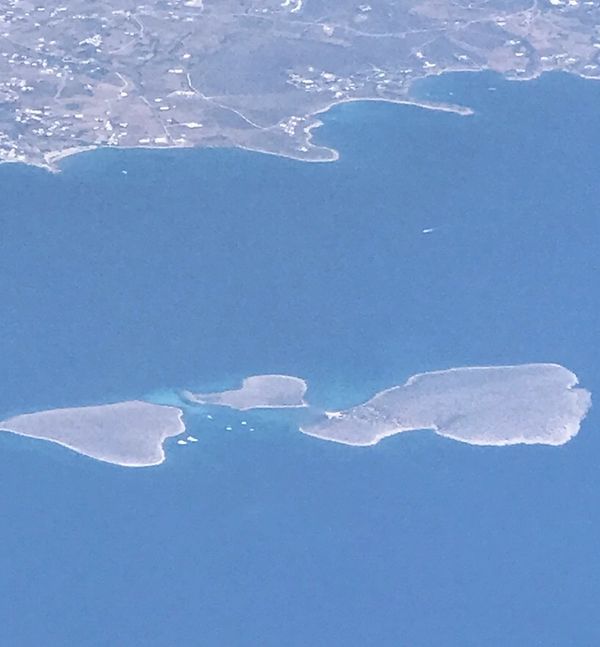 Double heart Greek islands on our way out from the plane window!
