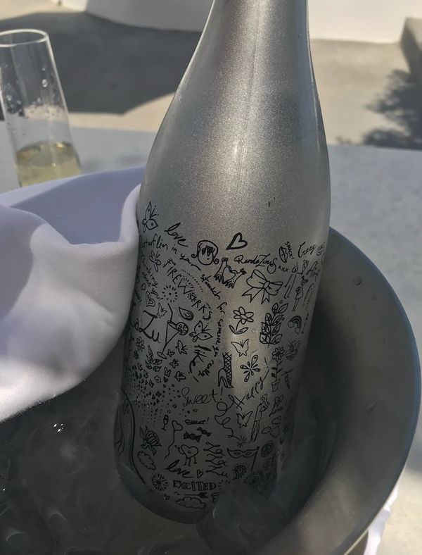 Celebrating my birthday. The hotel sent champagne and cake to our luxury cave villa, Oia, Santorini