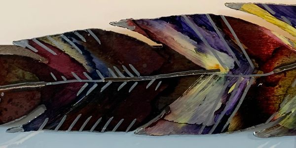 Close-up of a colorful, artistic feather with dark and purple hues.