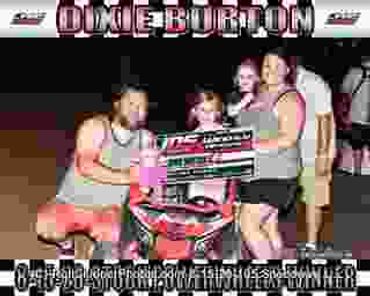 Winner holding a check and trophies after the Dixie Dirt On race.