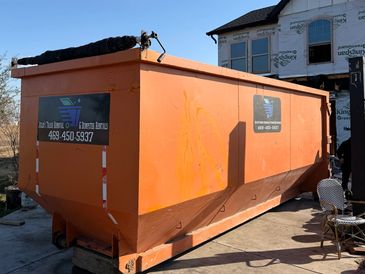 dumpster container at construction site.