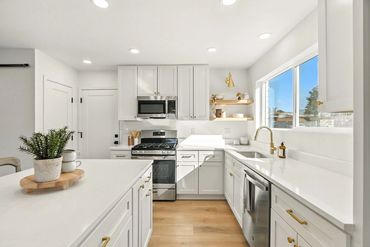 Complete kitchen remodel including cabinets, cabinet hardware, quartz countertops
