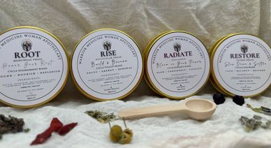 Four herbal remedy tins labeled Root, Rise, Radiate, and Restore.