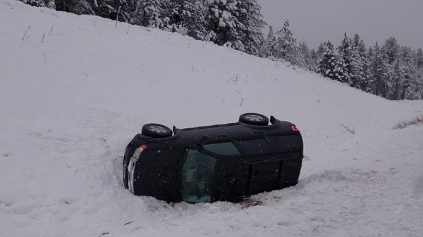 wreck with a vehicle landing on its side