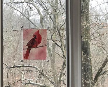The Messenger (male cardinal) pulp painting in hanging float frame.