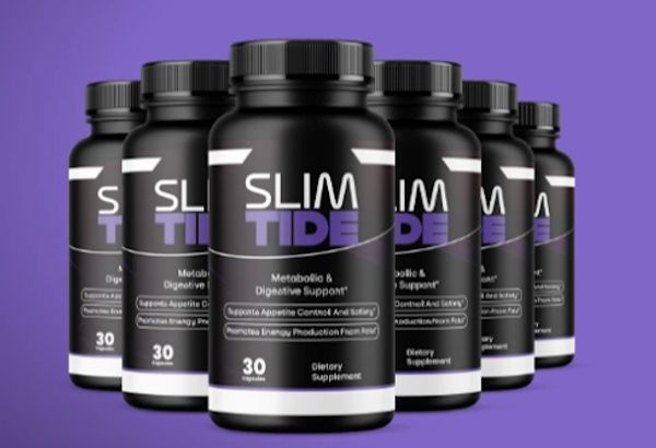 Bottles of Slim Tide dietary supplement for metabolism and digestive support.