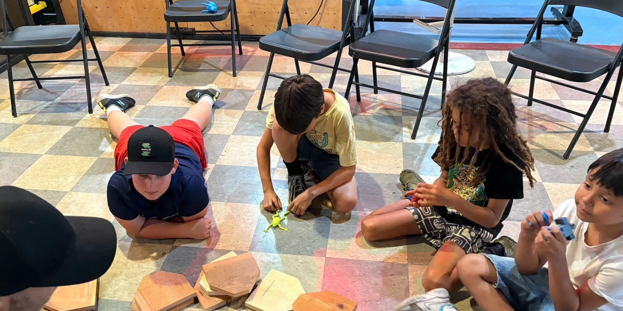 Kids working on a project in a group