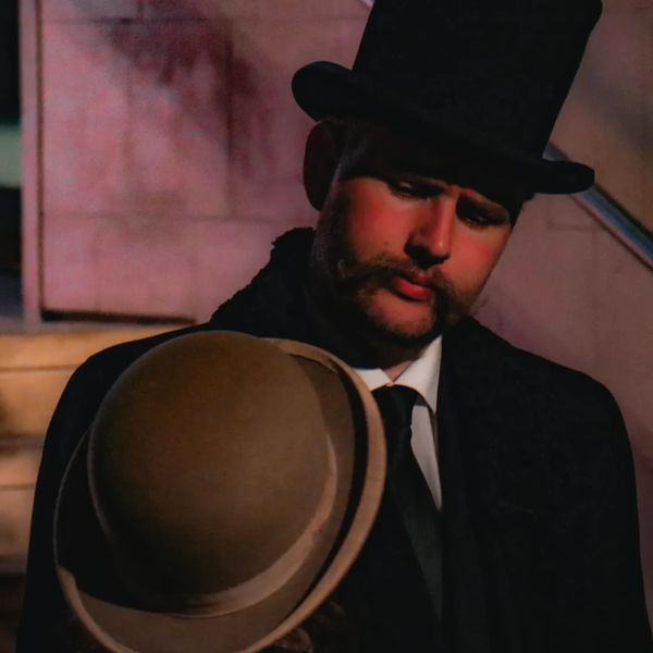 Billy Morton as Utterson in Dr Jekyll and Mr Hyde for Food for Thought at the Pitt Rivers Museum