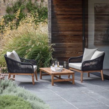 Patio with ornamental grasses, Puglia garden design. Wild at Heart
