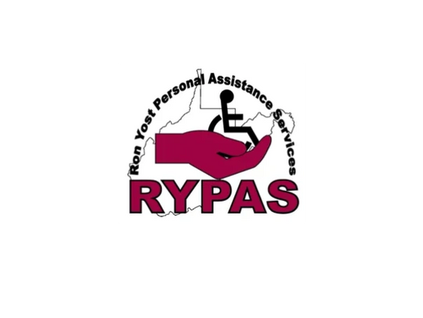 Ron Yost Personal Assistance Services logo RYPAS hand holding wheelchair