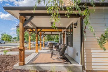 Large porch is across the front of the house, protected from the weather year round