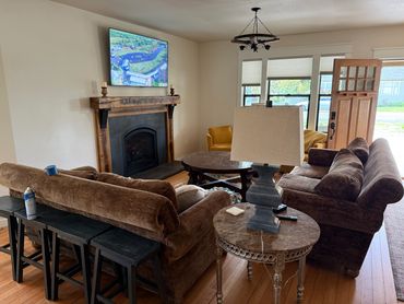 Spacious living room, 64" smart tv, gas fireplace, open concept with lots of space