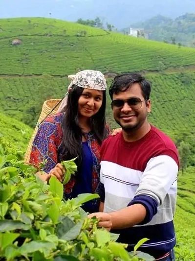 A honeymoon couple in the Munnar tea gardens.