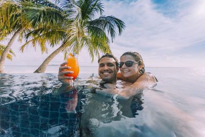 Honeymoon couple at Kovalam swimming pool