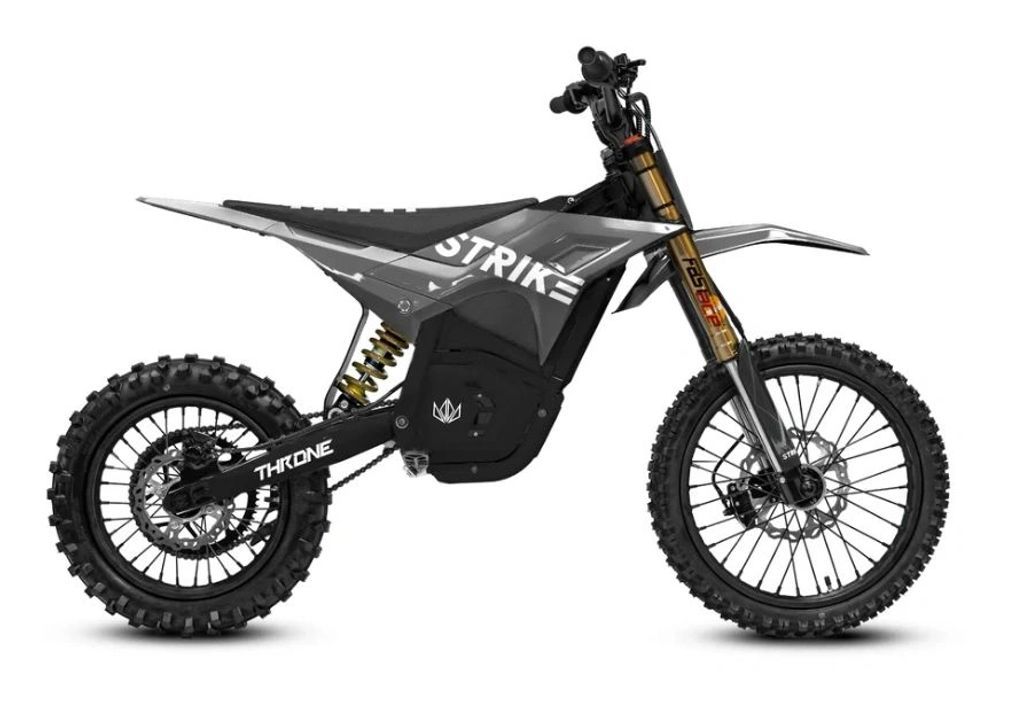 A black and gray off-road electric dirt bike.
