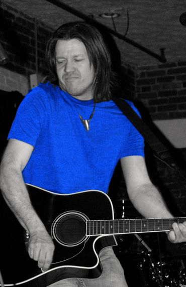 On stage with The Toluenes in Johnson City, TN in 2011.