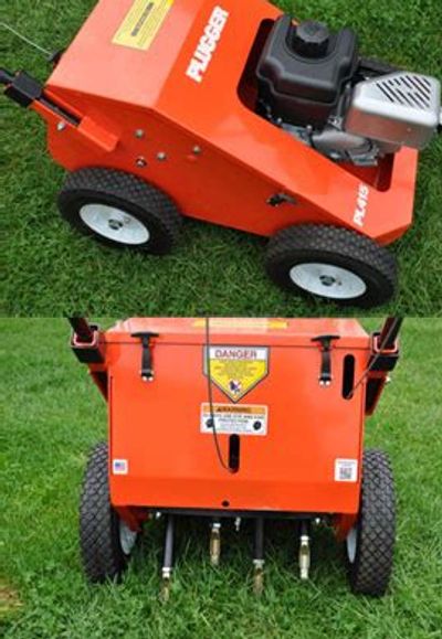 Plugger Aerator sitting on Grass