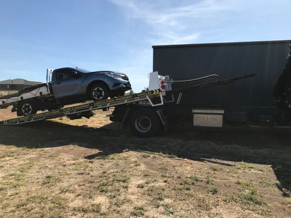 Tow truck loading Ute