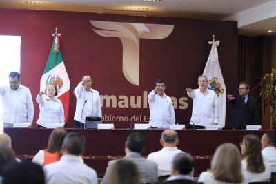 Officials taking an oath in a formal ceremony in Tamaulipas, Mexico.