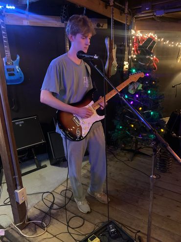 Another young guitarist onstage for his first stage appearance recently !