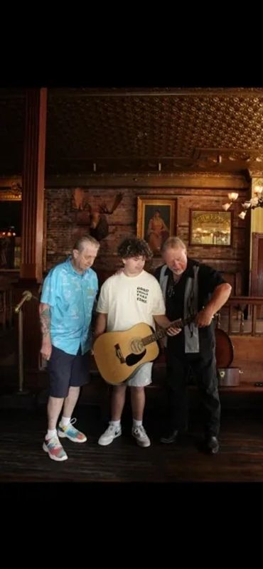 Jay Platt, one of our Board of Directors, with Jeremy and his new Guitar.
8/23/2026