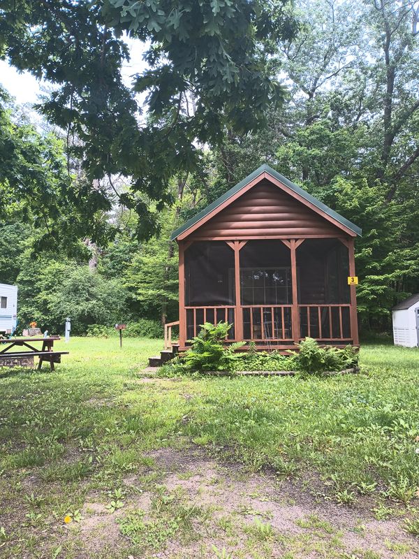 Stay at wisconsin dells campgrounds in a cabin rental with bathroom at nature's touch campground