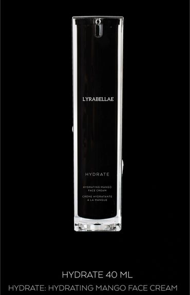 Black bottle of Lyrabellae Hydrate mango face cream on black background.