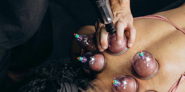 Photo by Jonathan Borba: https://www.pexels.com/photo/a-woman-getting-a-massage-with-a-ball-on-her-b