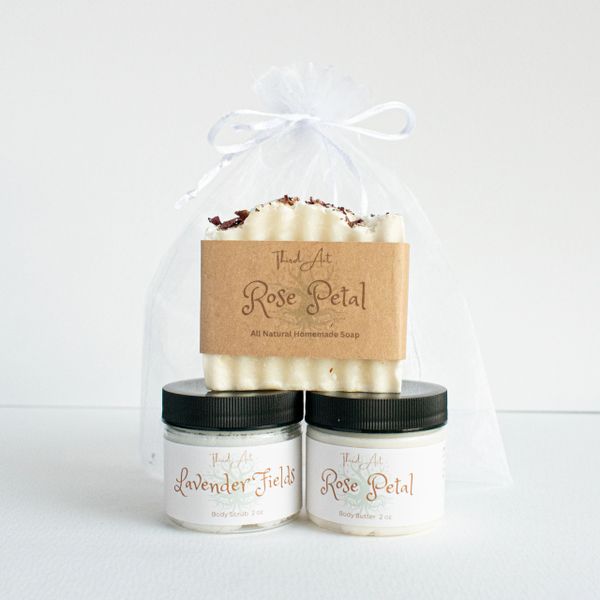 Natural rose petal soap with lavender and rose petal body butter in a gift bag.