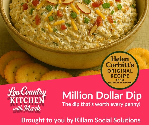 Creamy Million Dollar Dip topped with green onions, cheddar, tomatoes, and almonds, and crackers.