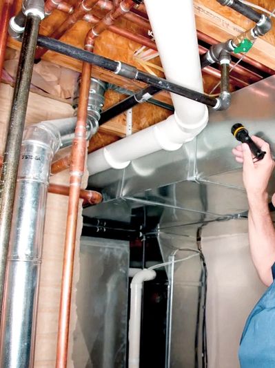 Inspection of the utility room in your home, which includes the plumbing and HVAC system.