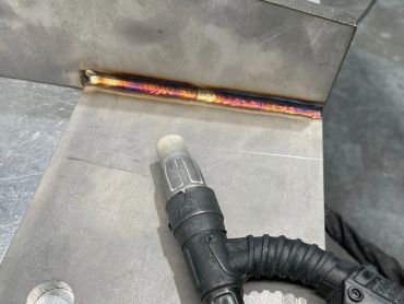 Colorful welding bead on metal pieces.