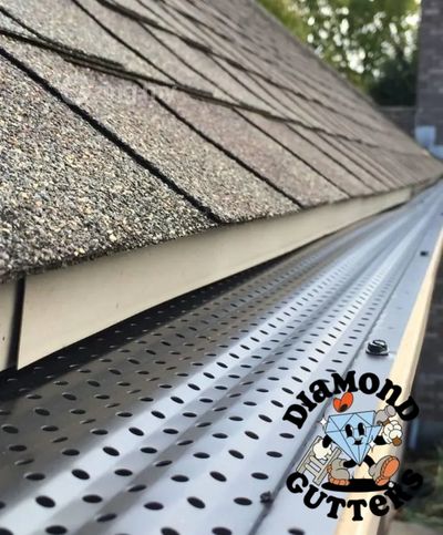 Diamond Gutters LLC's Aluminum gutter guards installed on a residential home in Washington, DC