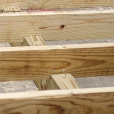 treated wooden runners for portable storage buildings
