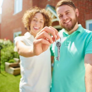Owners of new home holding keys 