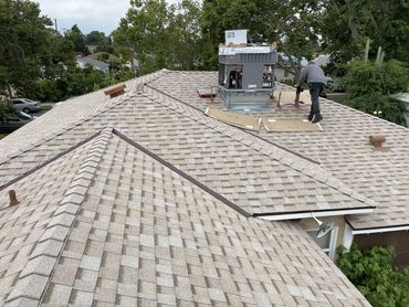 New A/C & Curb being installed on a new roof