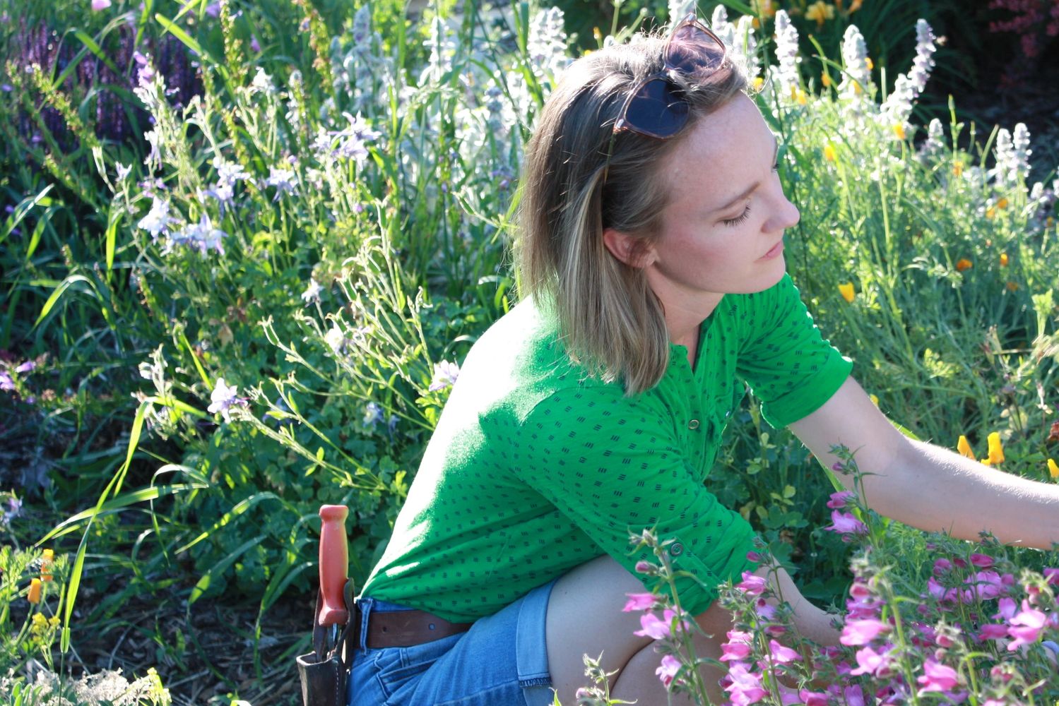 Professional horticulturist and Plant Health Consultant Sierra Laverty examines a garden in Idaho