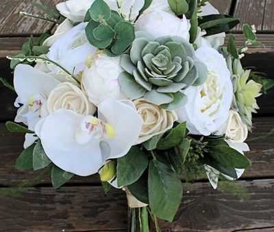 Orchid, rose, succulent wedding bouquet