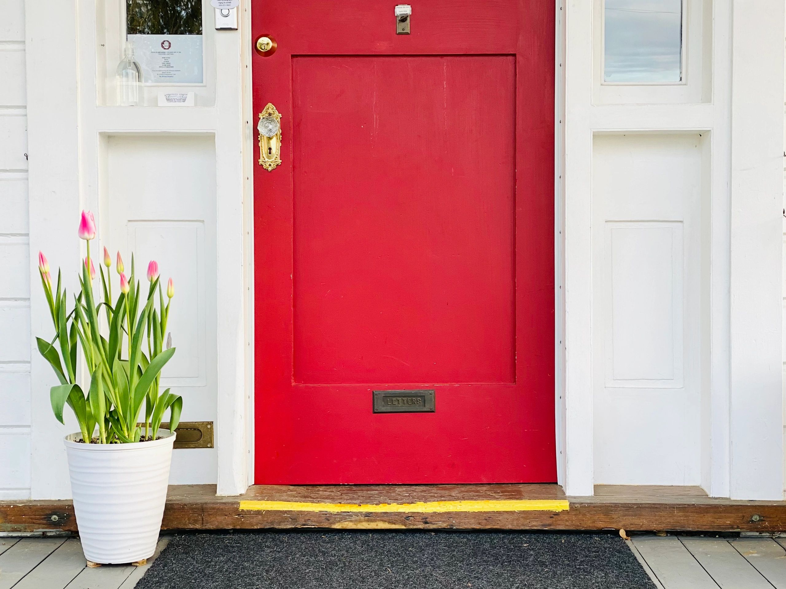 Red front door at Princess and the Pea Hotel