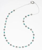 Necklace has Swarovski emerald crystals, silver beads, round clear beads,silver spacers,toggle clasp
