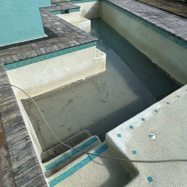 3 inches of mud at the bottom of the pool from Hurricane Milton.