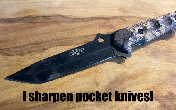 A black pocket knife on a wooden surface with text about sharpening.