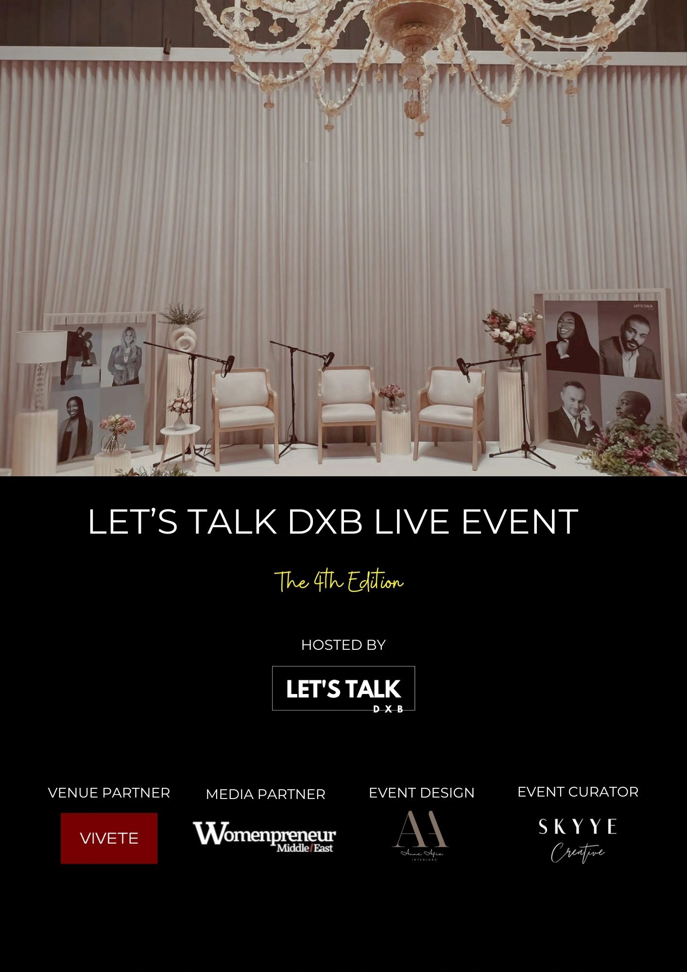Elegant panel setup for Let's Talk DXB live event with microphones and floral arrangements.