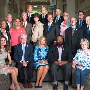 Group photo of College of The Albemarle Foundation Board of Directors featuring 18 individuals