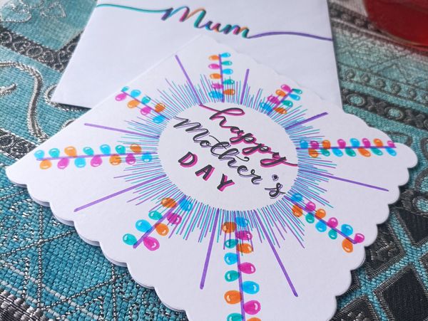 Photo of a greetings card with Josephine's calligraphy on it
