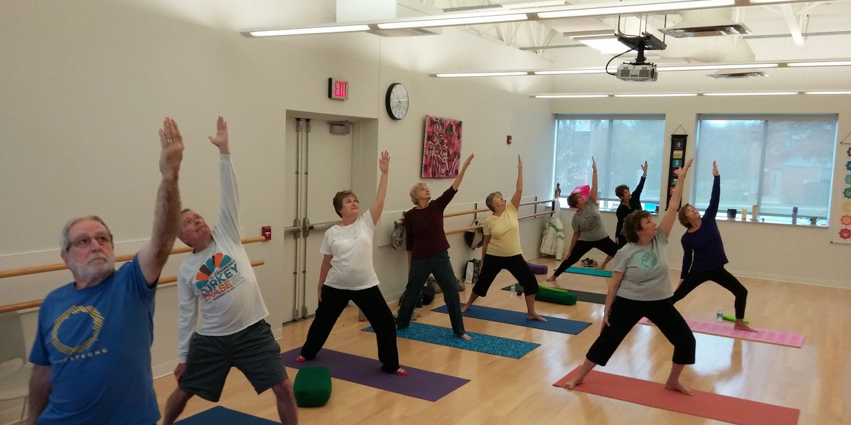 seniors doing yoga