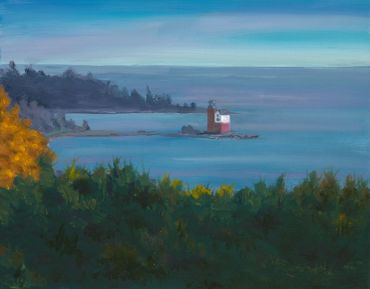 Coastal scene with lighthouse and trees.